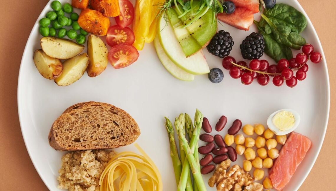 Assorted high-fiber foods including vegetables, fruits, nuts and grains