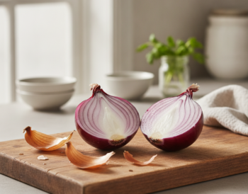 Sliced onion on a cutting board, a common folk remedy for sinus congestion